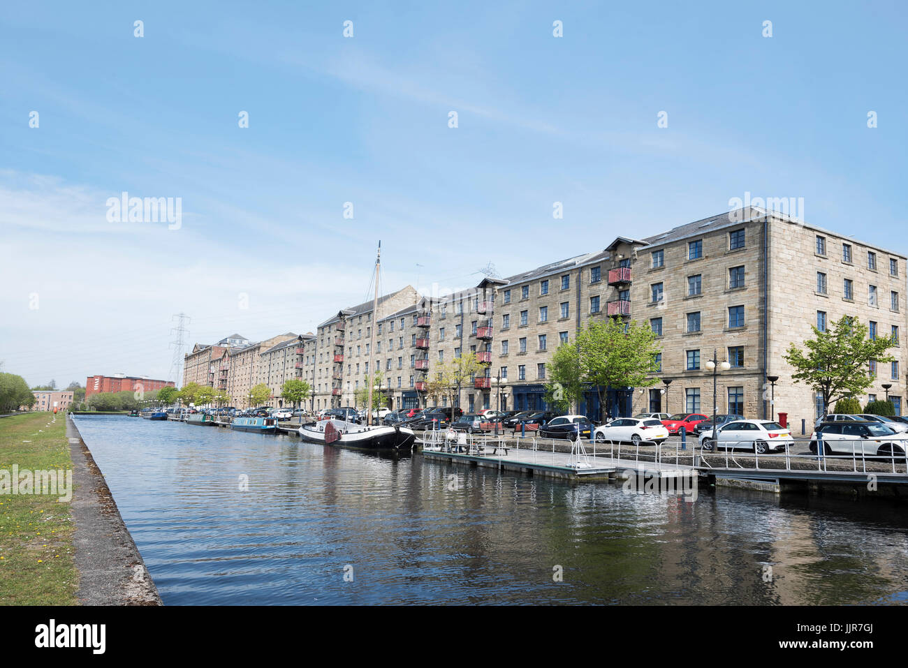 Speirs Wharf am Forth & Clyde Kanal im Zentrum von Glasgow.  Alte Gebäude umgebaut zu Wohnungen im wünschenswerten Bereich. Stockfoto
