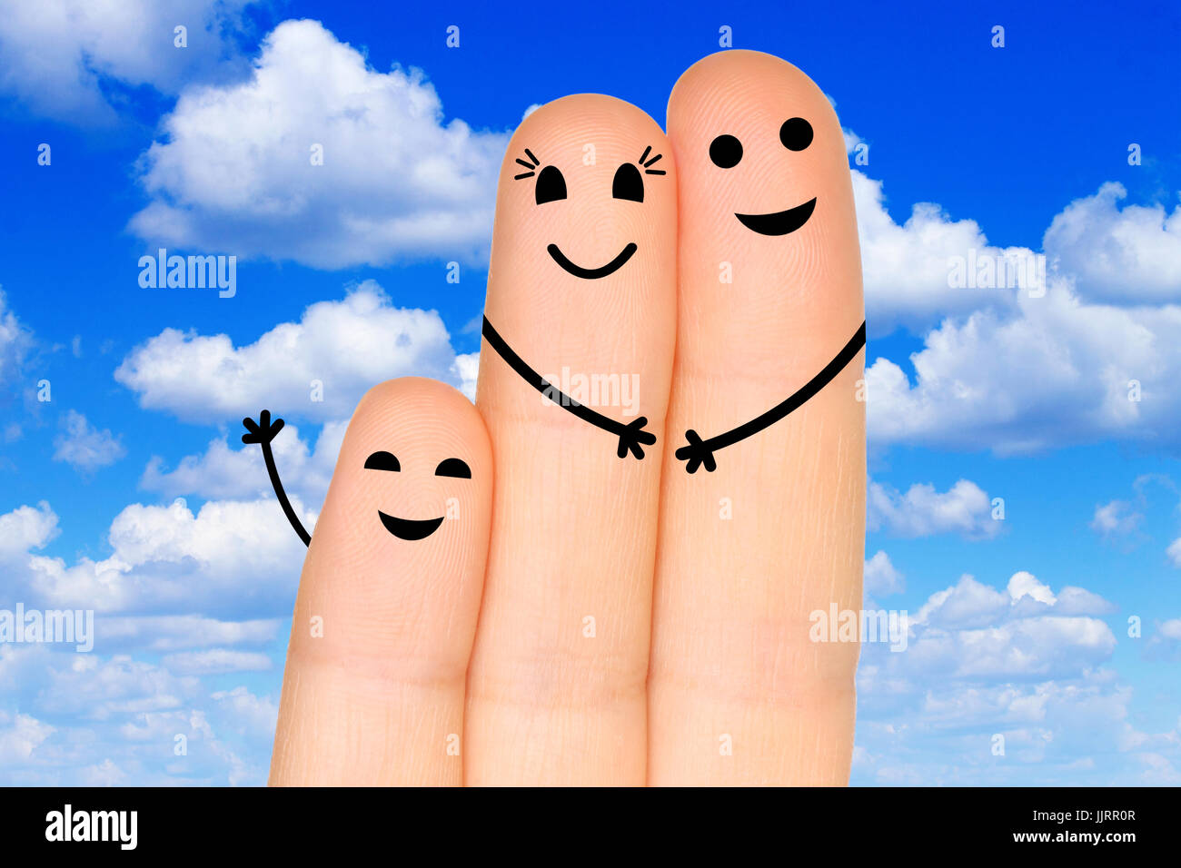 Glücklich Finger Familie am Himmelshintergrund Stockfoto