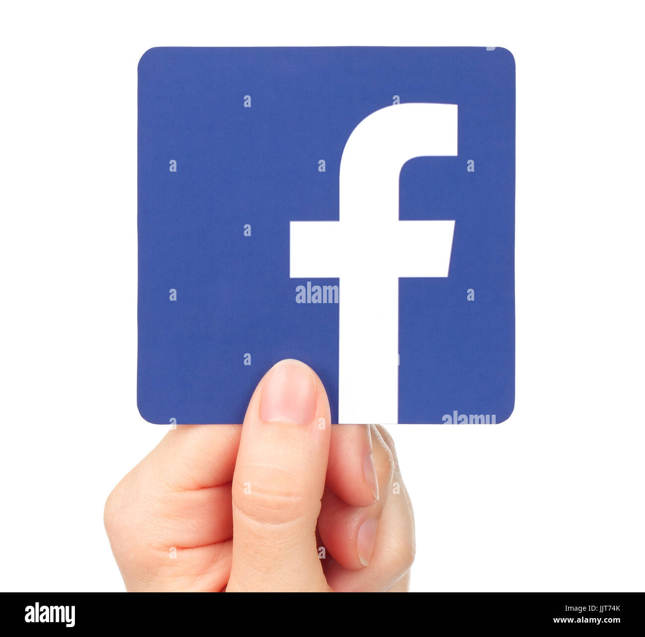Kiew, Ukraine - 20. Januar 2016: Hand hält Facebook-Symbol auf Papier gedruckt. Facebook ist ein bekannter social-Networking-Dienst Stockfoto