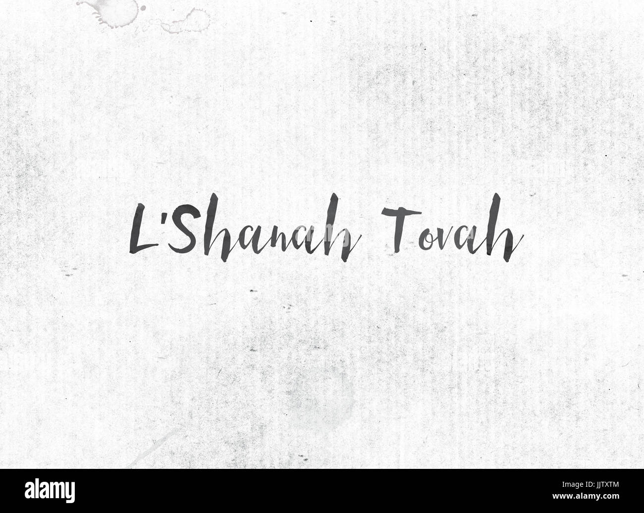 Die Worte L'Shanah Tovah Konzept und Design in schwarzer Tinte auf einem Aquarell waschen Hintergrund gemalt. Stockfoto