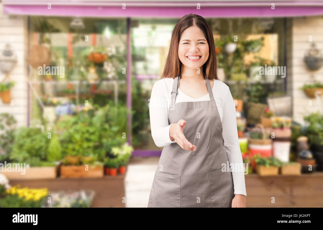 asiatische Frauen Blumengeschäft mit Blume Shop Hintergrund Stockfoto