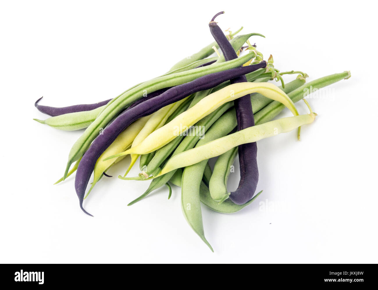 Menge des geernteten Bohne lila, grünen und gelben Wachsbohnen Snap Stockfoto