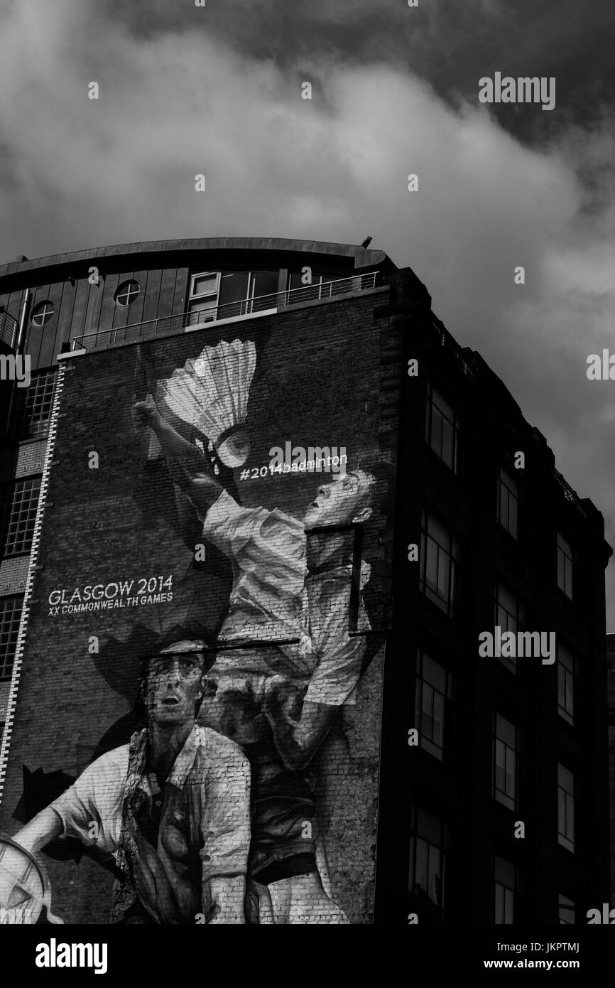 Street Art für den Glasgow Commonwealth Games 2014, an der Seite eines umgebauten Fabrikgebäude in Glasgow City Centre gemalt. Schottland, Großbritannien. Stockfoto