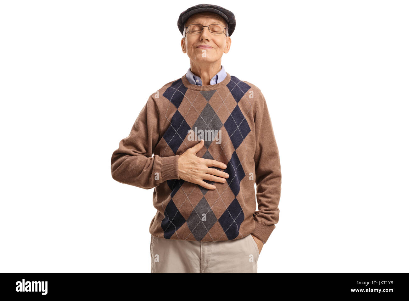 Zufrieden Senior hält seine Hand auf seinen Bauch, nachdem er eine Mahlzeit oder ein Getränk isoliert auf weißem Hintergrund Stockfoto