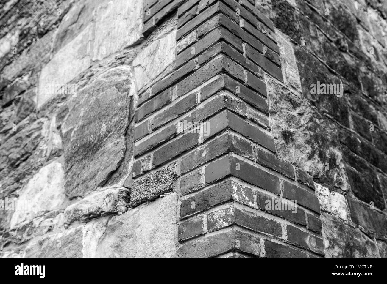 Schwarze und weiße alten Ziegelsteine Stockfoto