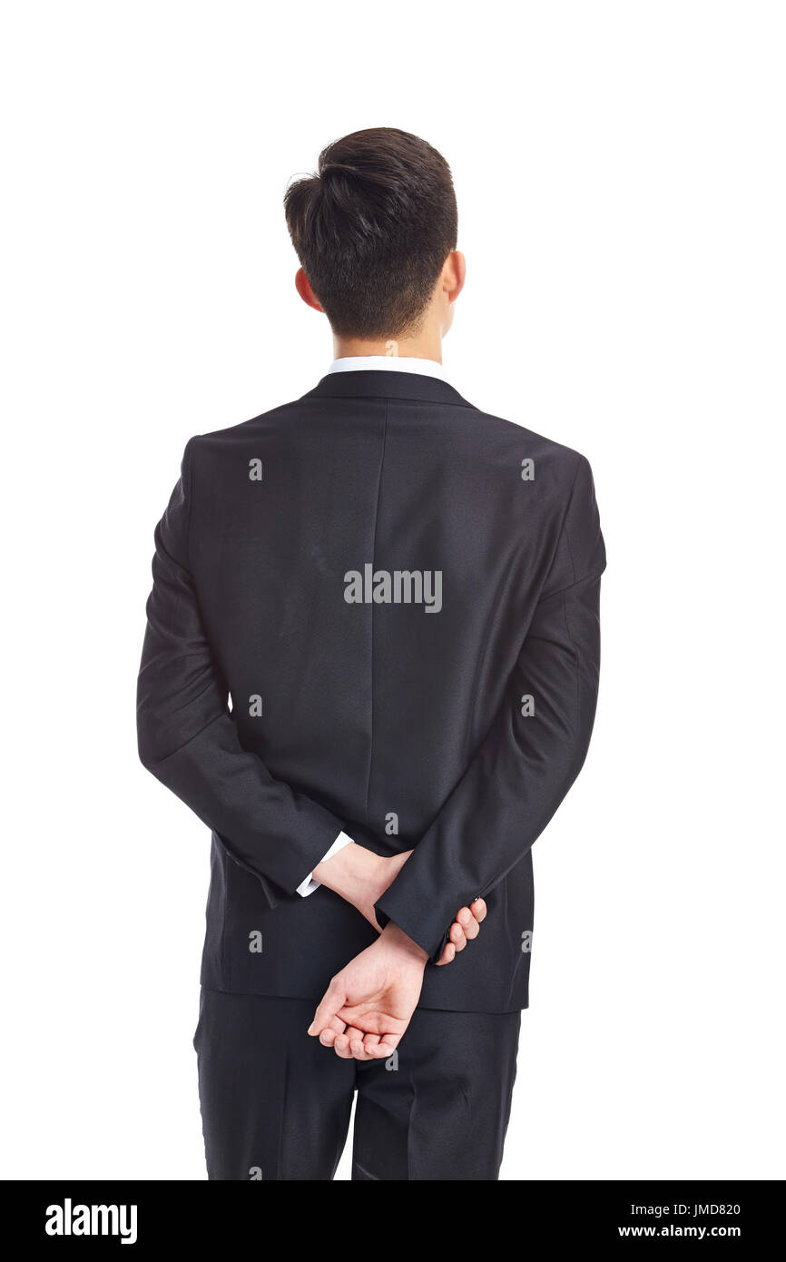 Rückansicht eines Betrachtung jungen asiatischen Geschäftsmann, Studio gedreht, isoliert auf weißem Hintergrund. Stockfoto