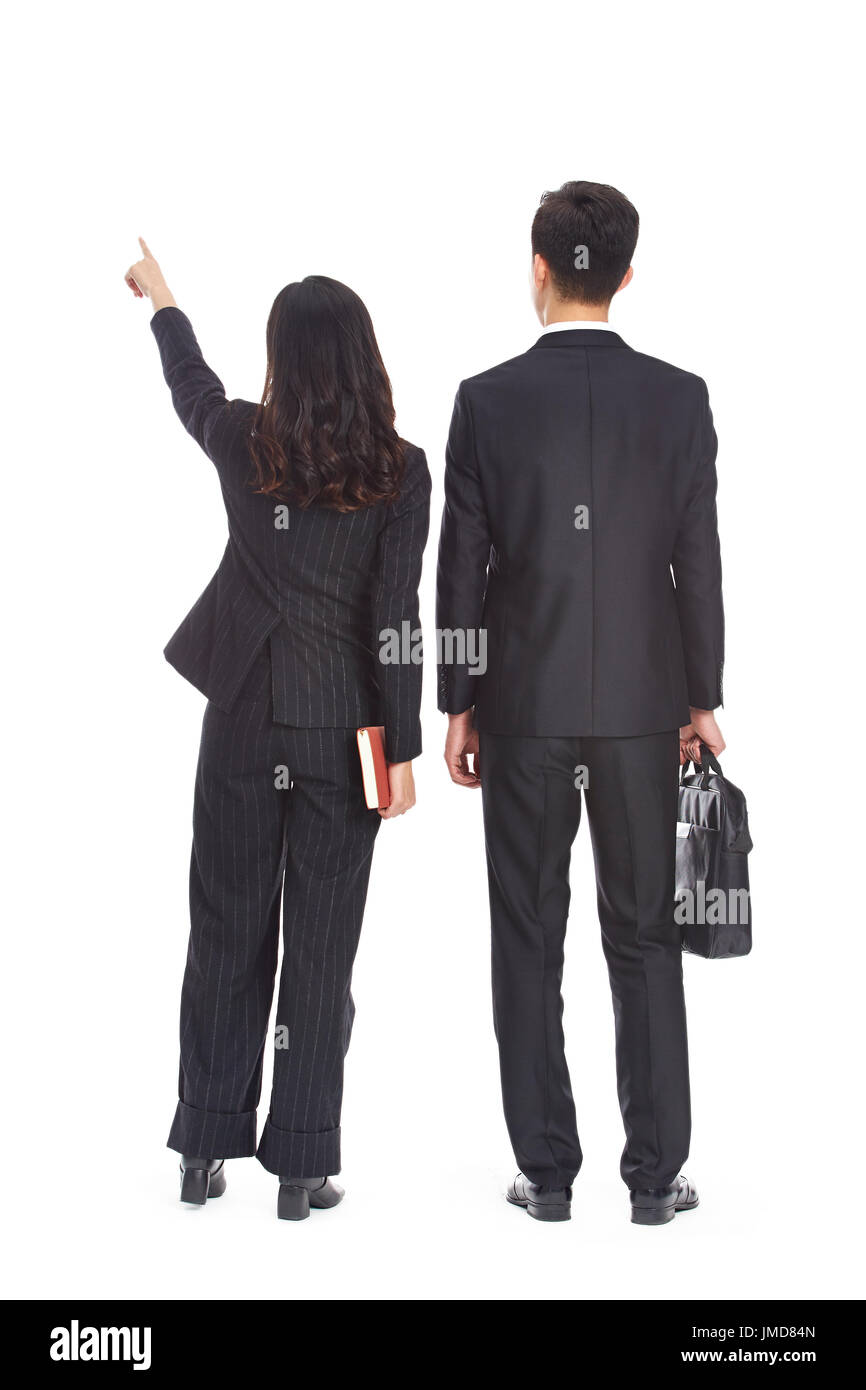 junge asiatische Geschäftsmann und Frau, auf die Entfernung, Rückansicht, isoliert auf weißem Hintergrund. Stockfoto