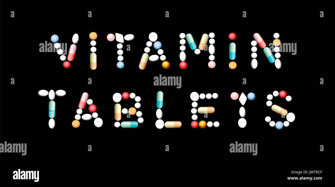 VITAMINTABLETTEN mit Pillen - zur Aufnahme von Vitaminen neben Naturkost geschrieben. Stockfoto
