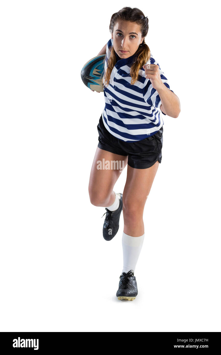 Voller Länge Sportlerin mit Rugby-Ball vor weißem Hintergrund ausgeführt Stockfoto