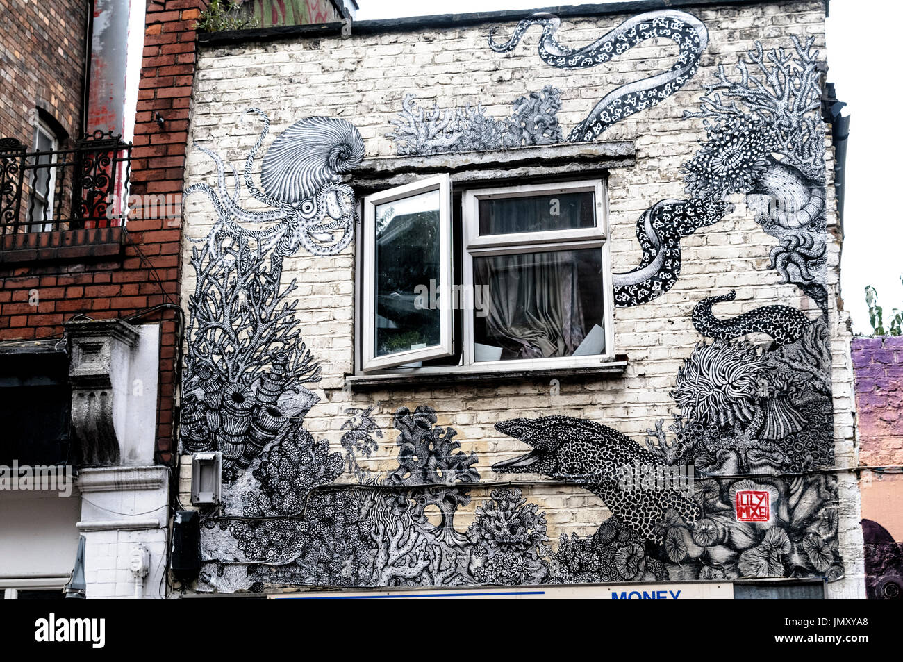 Graffiti in der Brick Lane, East London. Stockfoto