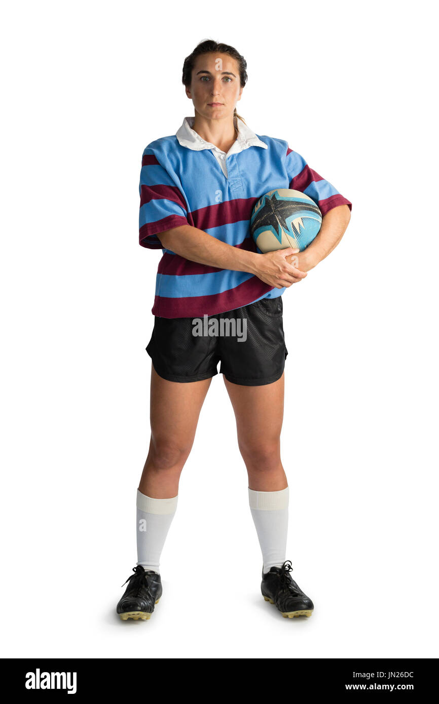 In voller Länge Portrait von Spielerin mit Rugby-Ball vor weißem Hintergrund Stockfoto