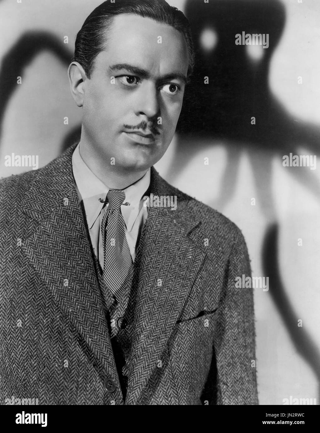 John Eldredge, am Set des Films, "Sh! Die Kraken, Warner Bros., 1937 Stockfoto