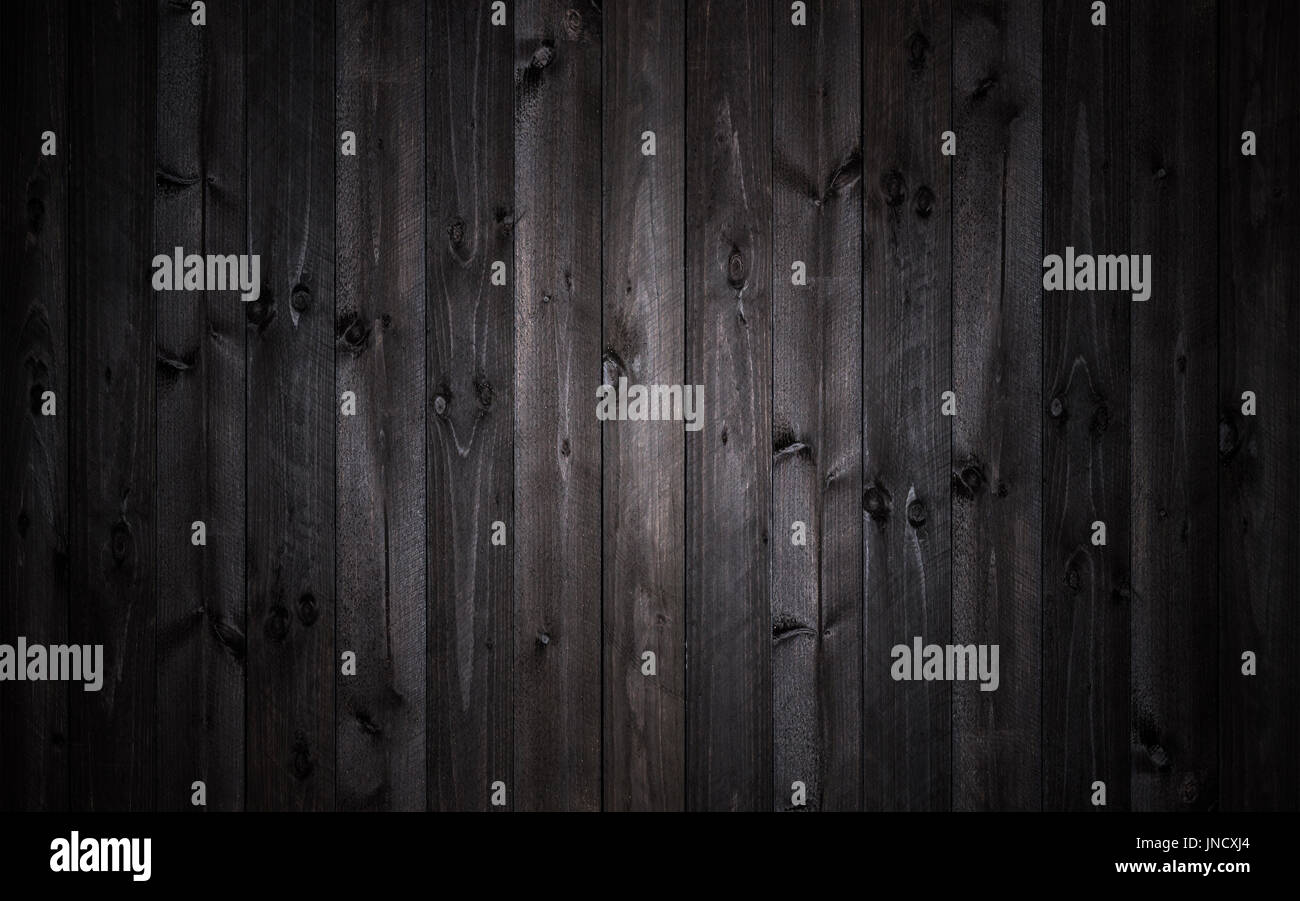 Dunkles Holz, schwarze Hintergrundtextur Stockfoto