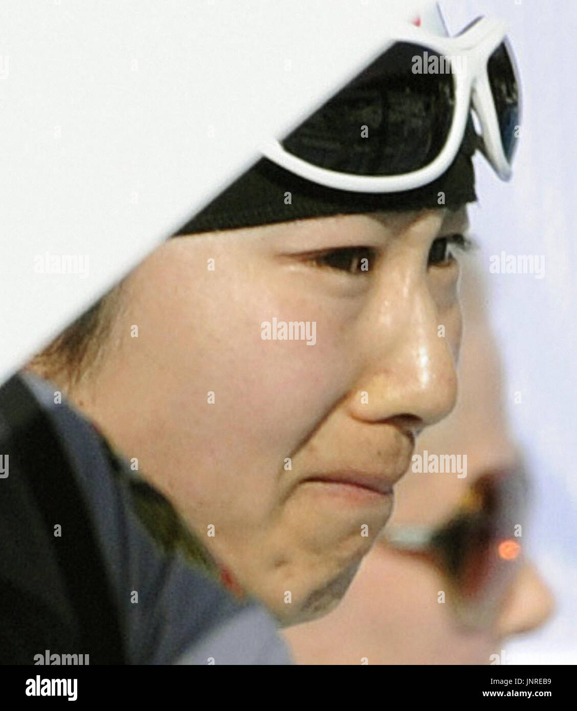 WHISTLER, Kanada - Madoka Natsumi Japans vergießt Tränen nach dem Ausscheiden im Viertelfinale der die Winterspiele in Vancouver Women Langlauf Einzelsprint Classic am 17. Februar 2010, im Whistler Olympic Park, Whistler, Kanada. (Kyodo) Stockfoto