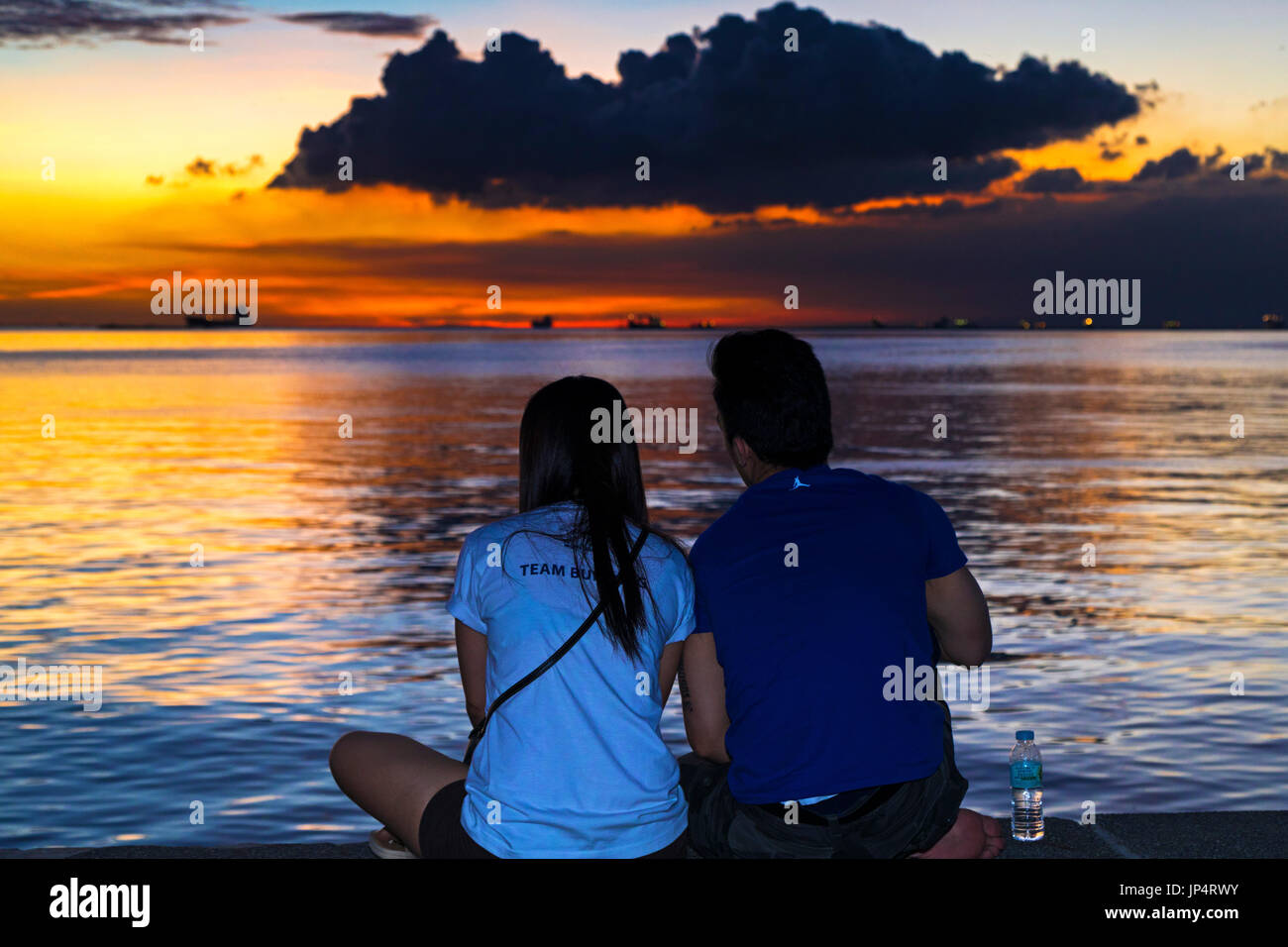 Sonnenuntergang an der Bucht von Manila, Roxas Boulevard, Philippinen Stockfoto