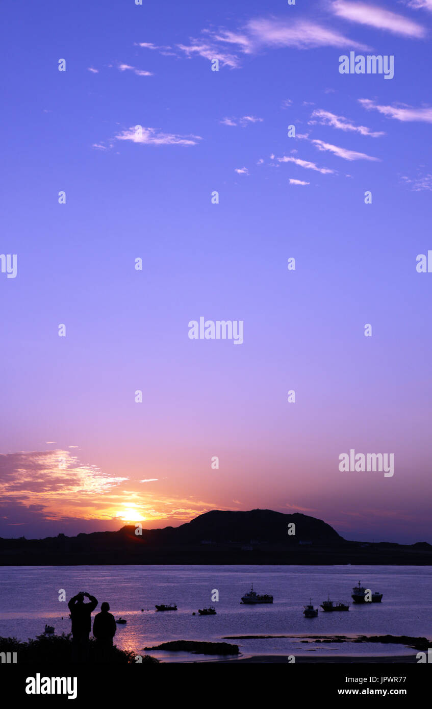Die Bilder des Sonnenuntergangs über Iona von Fionnphort auf der Isle of Mull, Schottland Stockfoto