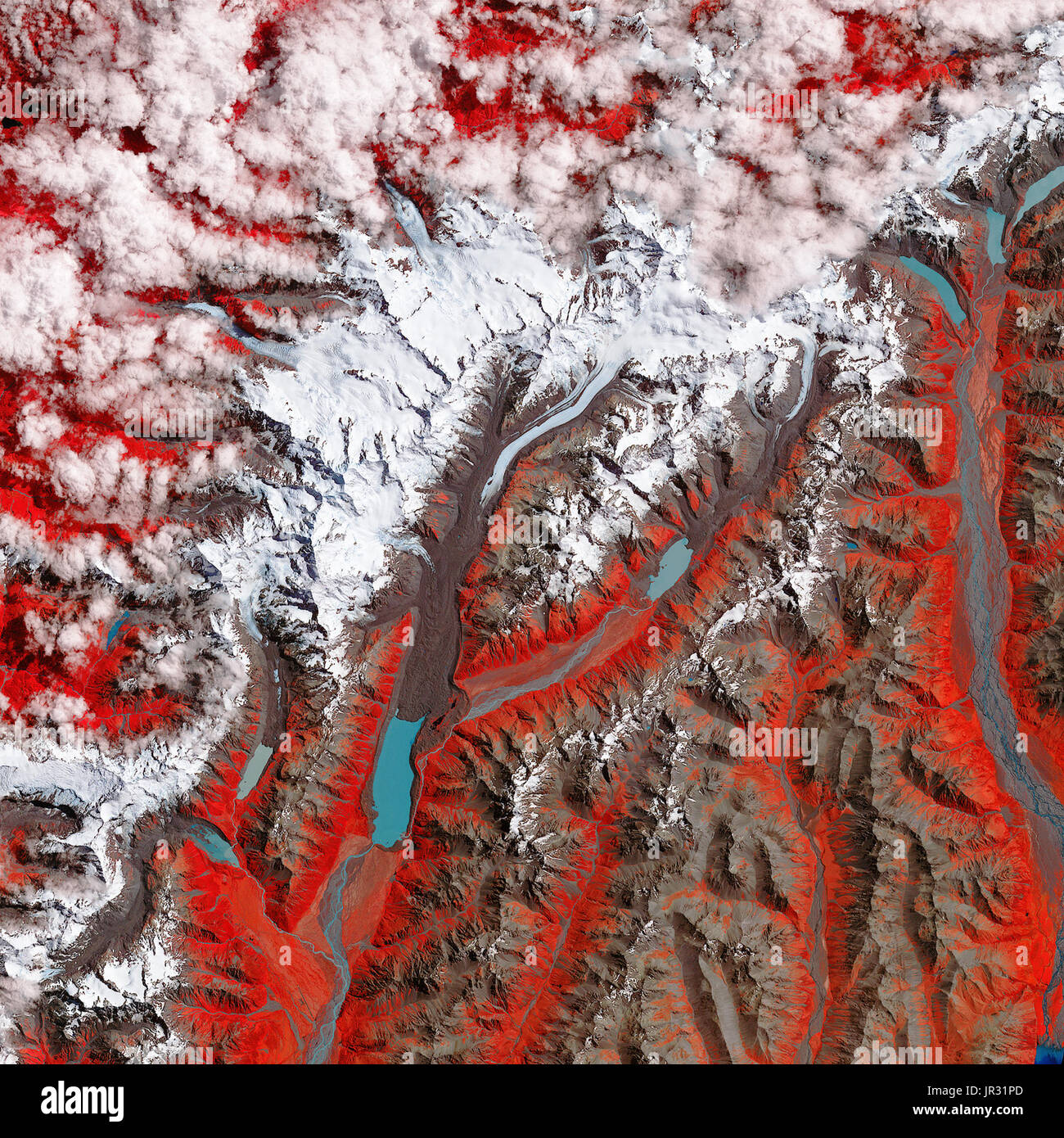 New Zealand Tasman-Gletscher am 29. Januar 2017, ergriffen von der Advanced Spaceborne Thermal Emission und Reflexion Radiometer auf NASA Satelliten Terra. Vergleichen Sie mit JG5750 von 1990, zu sehen, wie die Gletscher abnimmt. In diesem Falschfarbenbild weiß ist Schnee und Eis, rot ist Vegetation blau ist Wasser und Boden braun ist (einschließlich Moränen und Sediment bedeckten Gletscher). Stockfoto