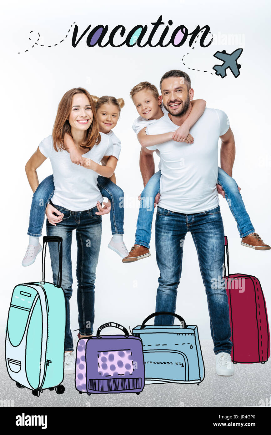 Eltern, glückliche Kinder Huckepack Stockfoto