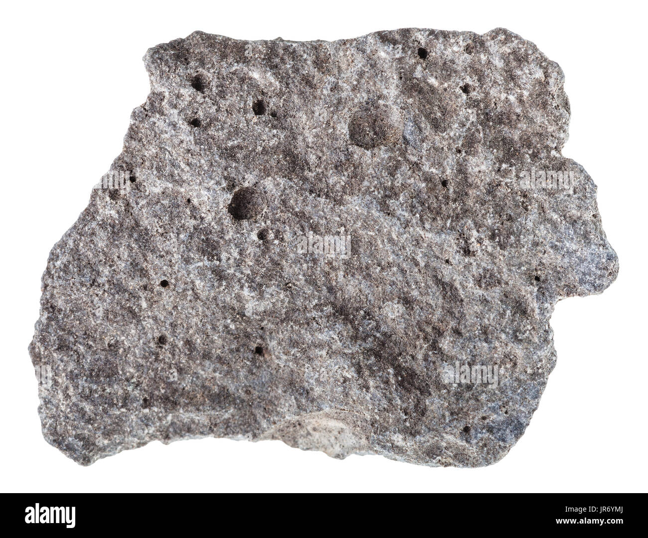 Makroaufnahmen der Probe magmatischen Naturstein - Stück von porösen Basalt Stein isoliert auf weißem Hintergrund aus Russland Stockfoto