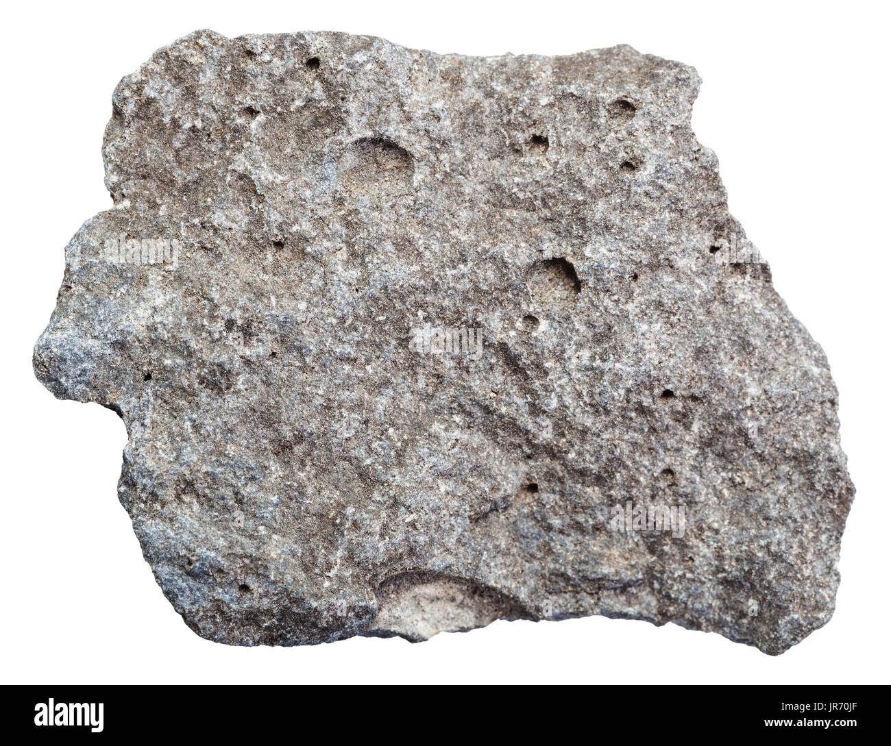 Makroaufnahmen der Probe magmatischen Naturstein - roh porösen Basalt Stein isoliert auf weißem Hintergrund aus Russland Stockfoto