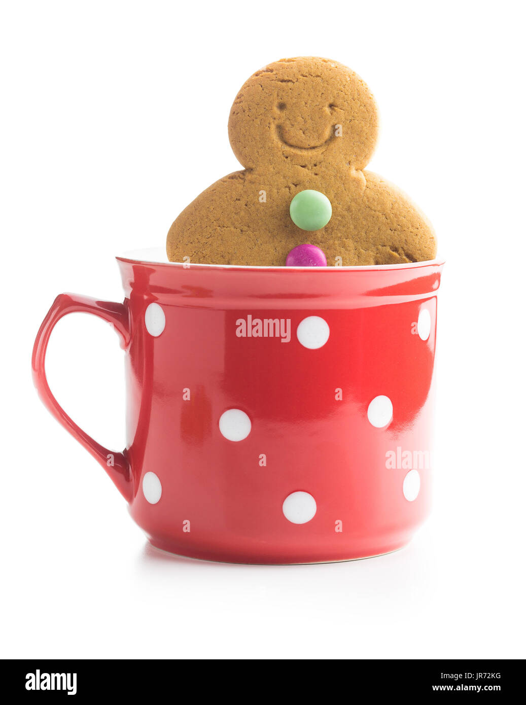 Süße Lebkuchen-Mann im Cup isoliert auf weißem Hintergrund. Weihnachten Lebkuchen. Stockfoto