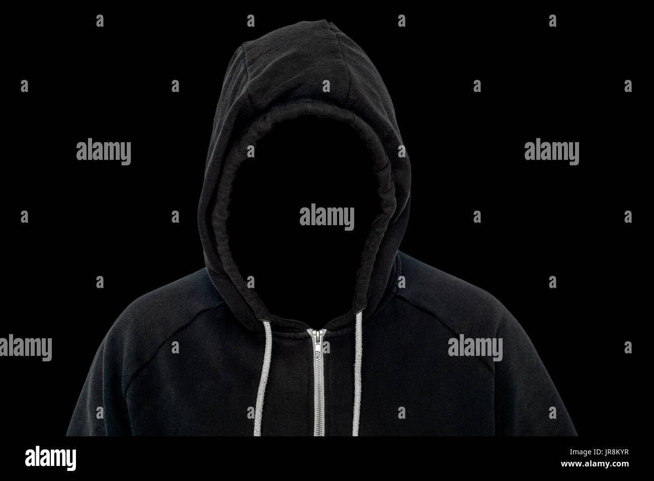 Der Mann ohne Gesicht trägt einen dunklen schwarzen Top für die Verwendung mit Technologie und Cyber-Kriminellen Konzepte und Ideen Stockfoto