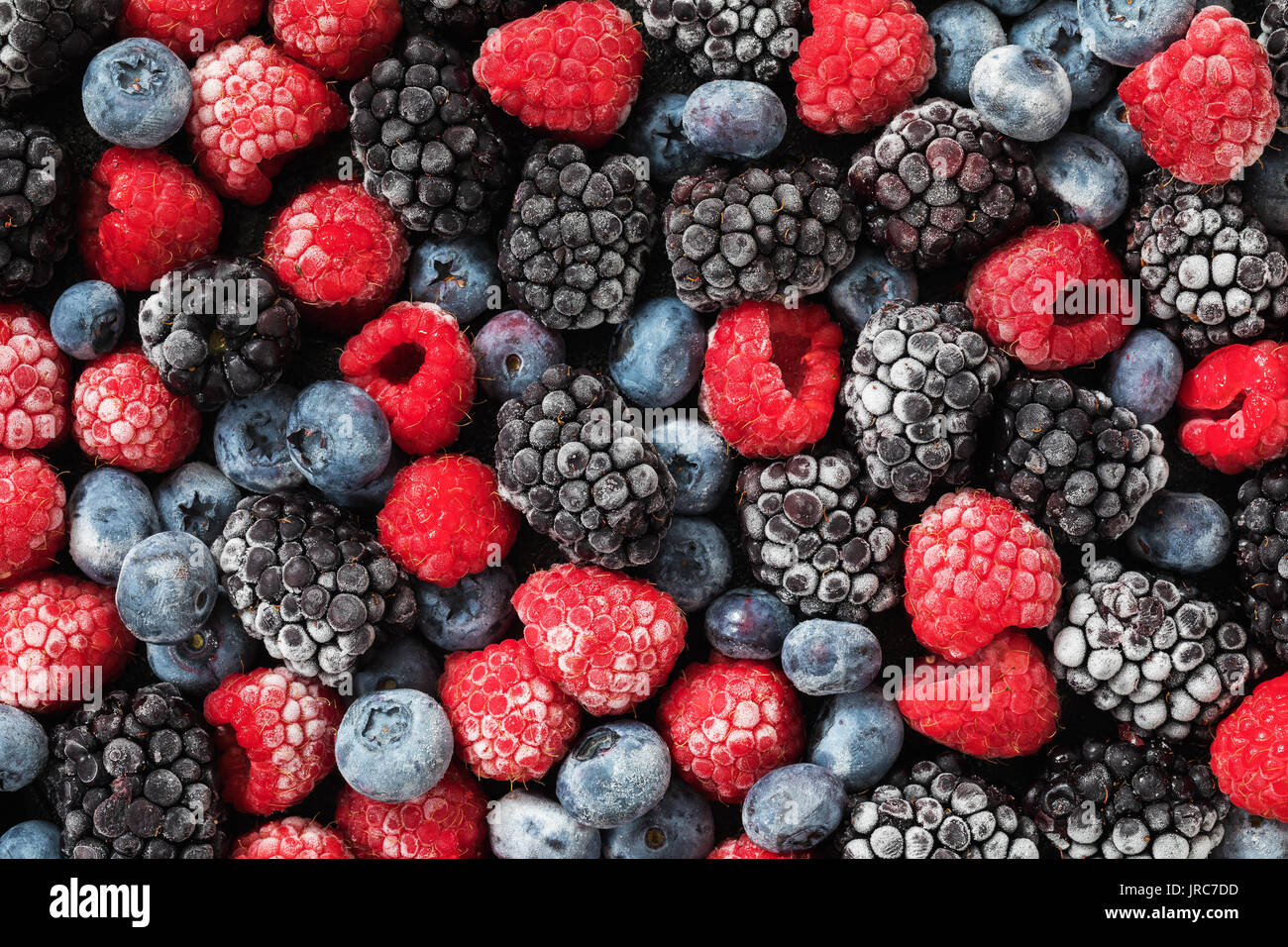 Sortiert tiefgefrorene Beeren Hintergrund, Ansicht von oben Stockfoto