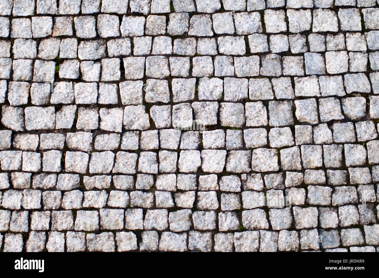 Cobblestone vintage Bürgersteig Hintergrund. Stockfoto