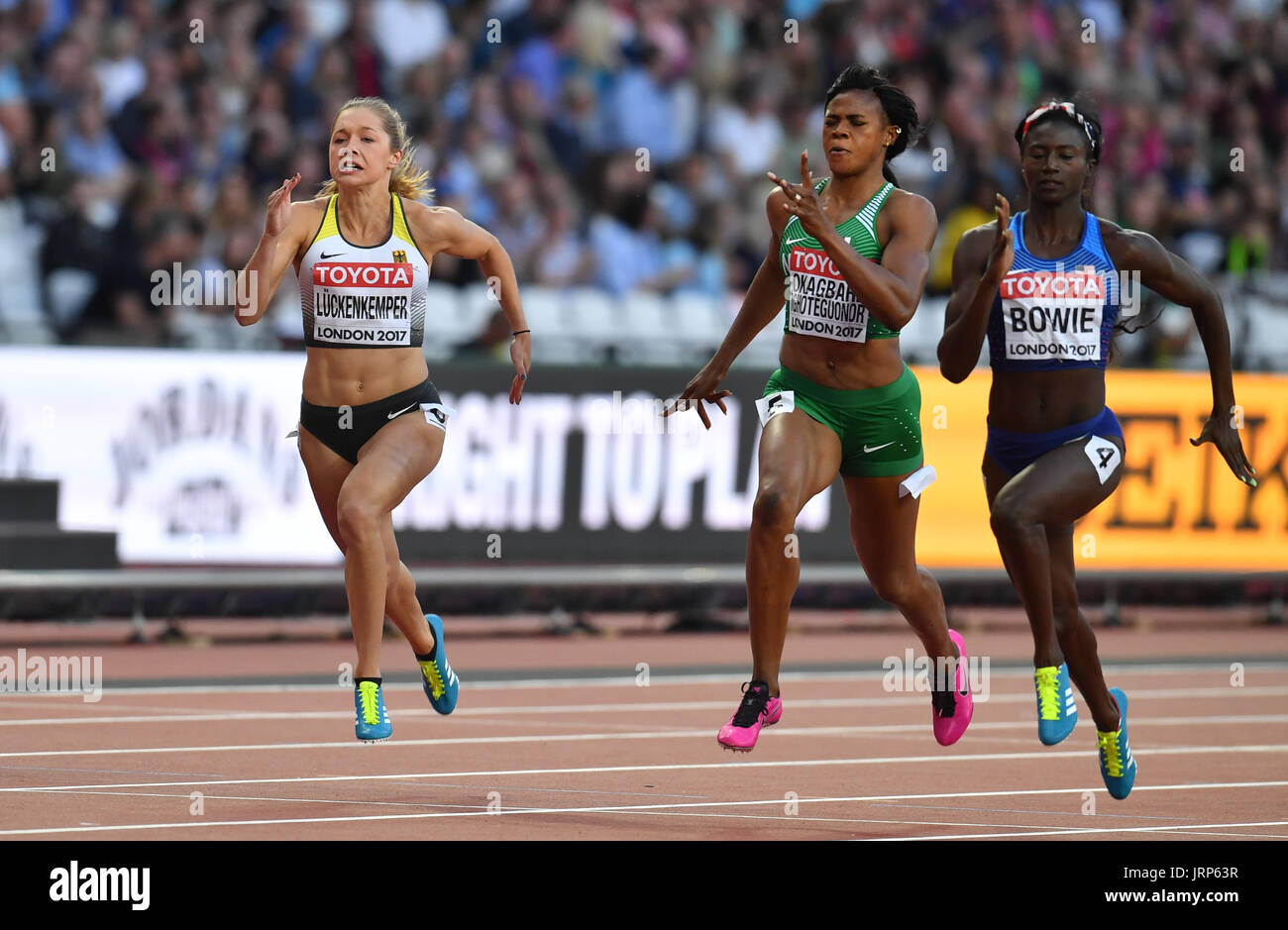 (l-R) Gina Lueckenkemper Segen Okagbare-Ighoteguonor von Nigeria, Deutschland, Tori Bowie von Vereinigten Staaten in Aktion in der Frauen 100 m im Halbfinale bei der IAAF Weltmeisterschaften in der Leichtathletik im Olympiastadion in London, UK, 6. August 2017. Foto: Bernd Thissen/dpa Stockfoto