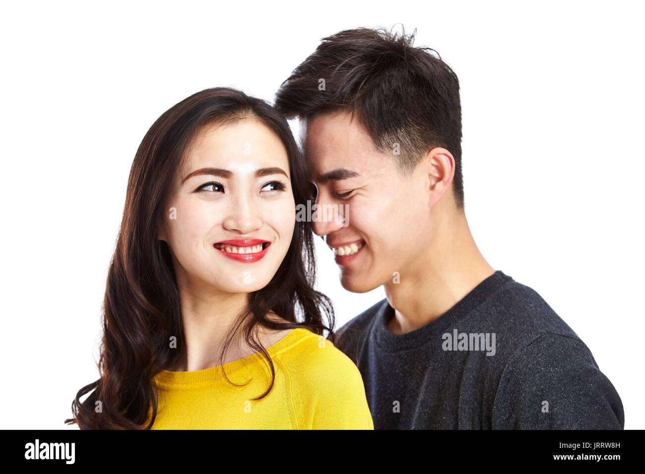Porträt der jungen und schönen asiatischen Paar, auf weißem Hintergrund. Stockfoto