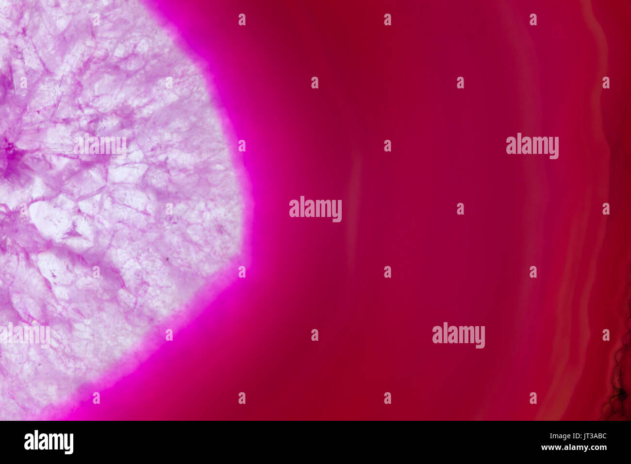 Extreme Makro von rosa Achat Scheibe Mineral, abstrakten Hintergrund Stockfoto