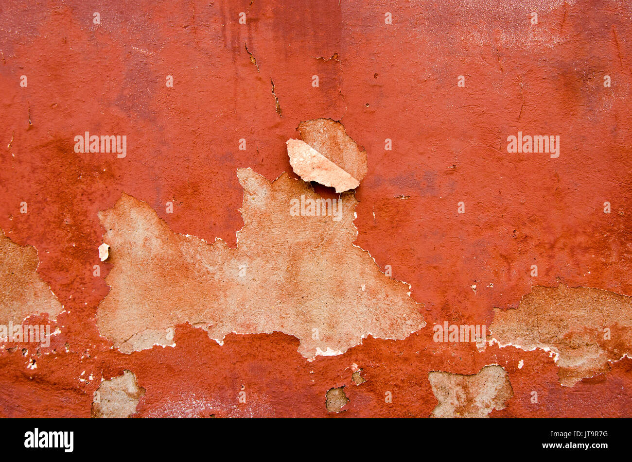 Steinmauer mit abgeplatzte Farbe Textur Stockfoto