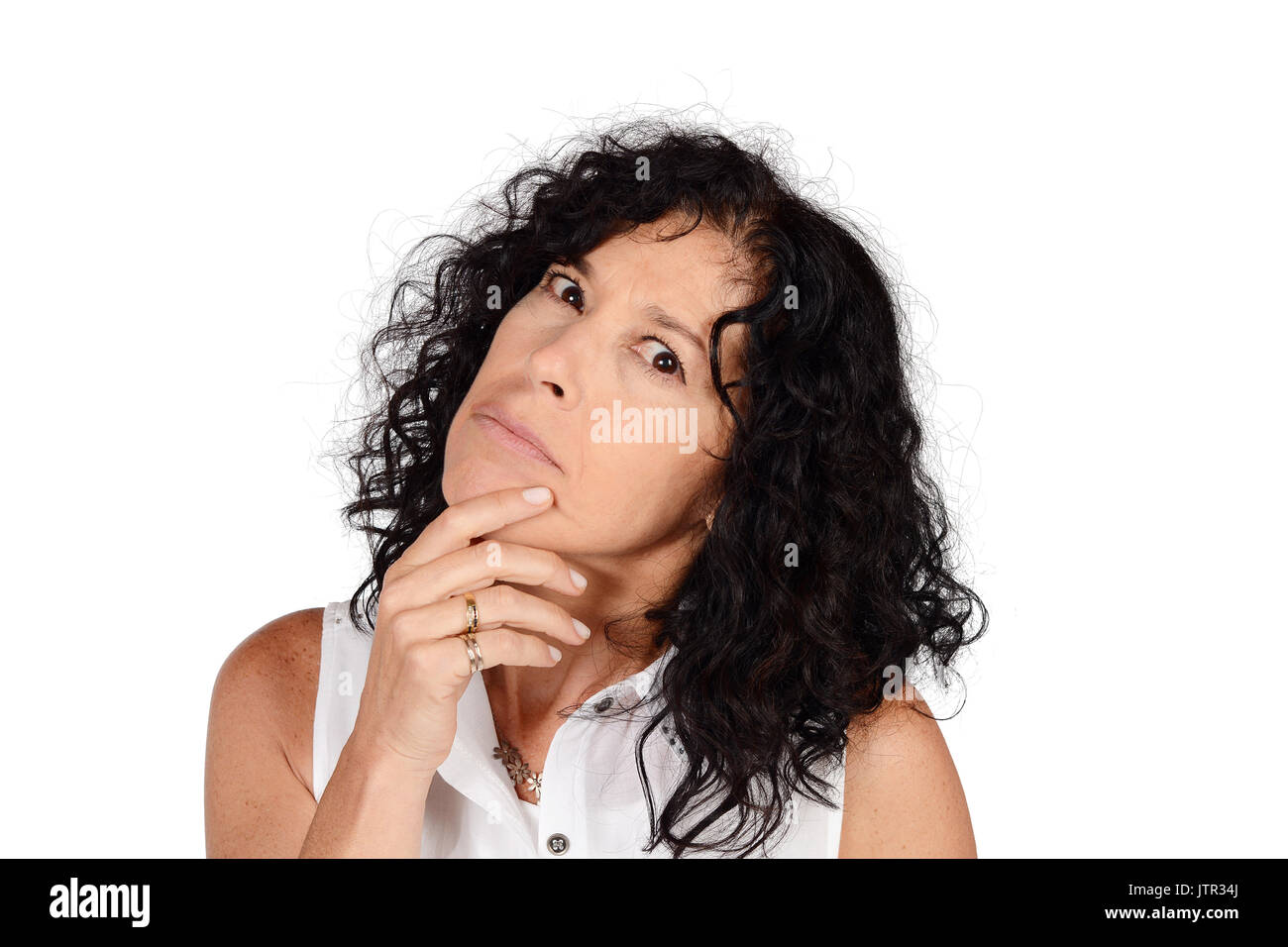 Schöne nachdenkliche Womanl im Studio. Isolierten weißen Hintergrund. Stockfoto