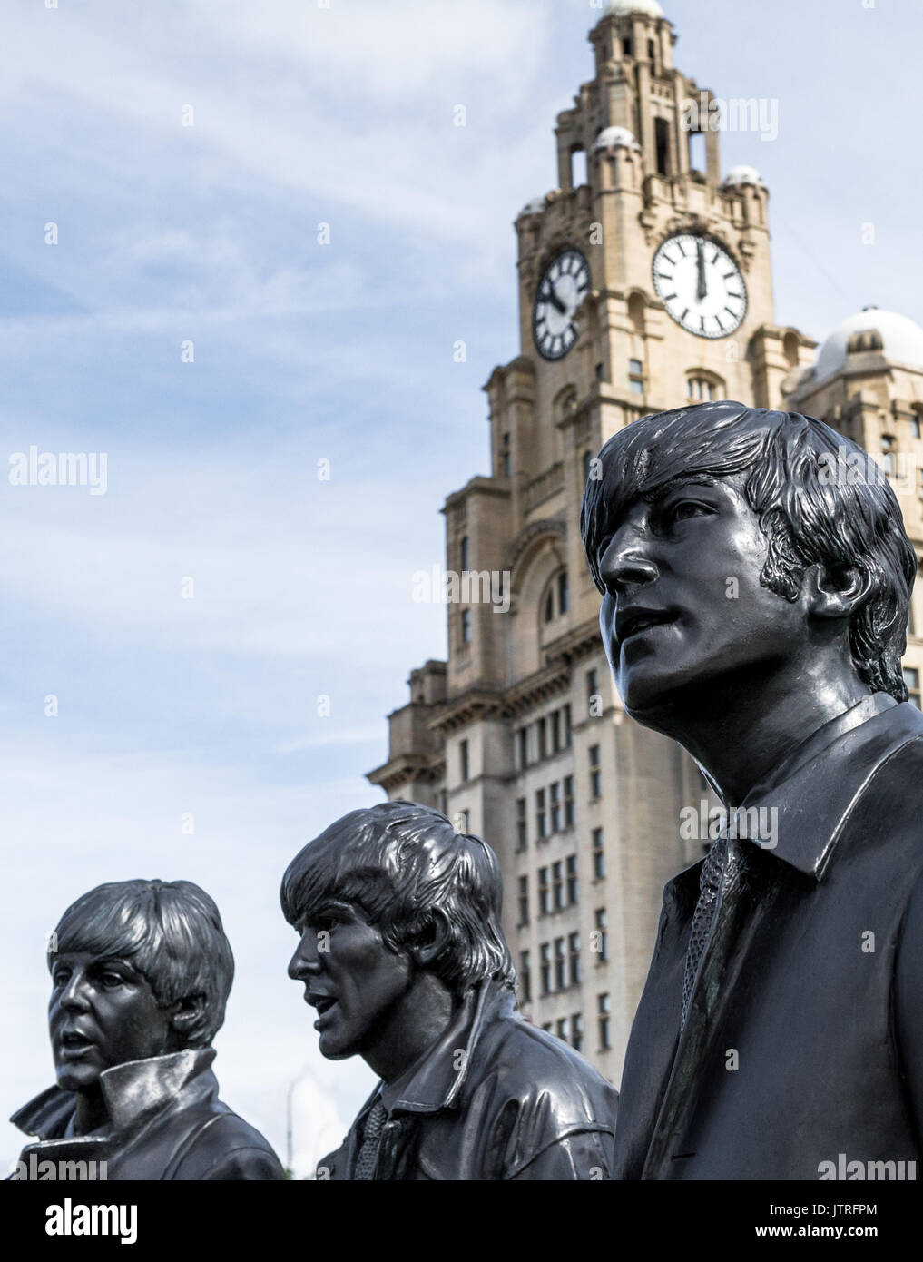 Die Beatles Skulpturen auf Liverpools Wasser vor. Stockfoto