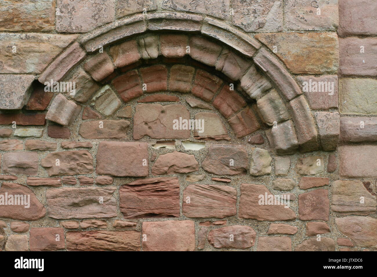 Mauerwerk detail, Lindisfarne Abtei Stockfoto