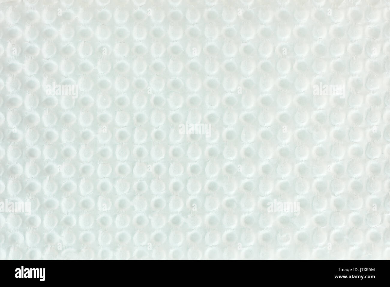 Weiß holprigen Verpackung Karton Textur. Abstrakte helle Oberfläche Hintergrund. Stockfoto