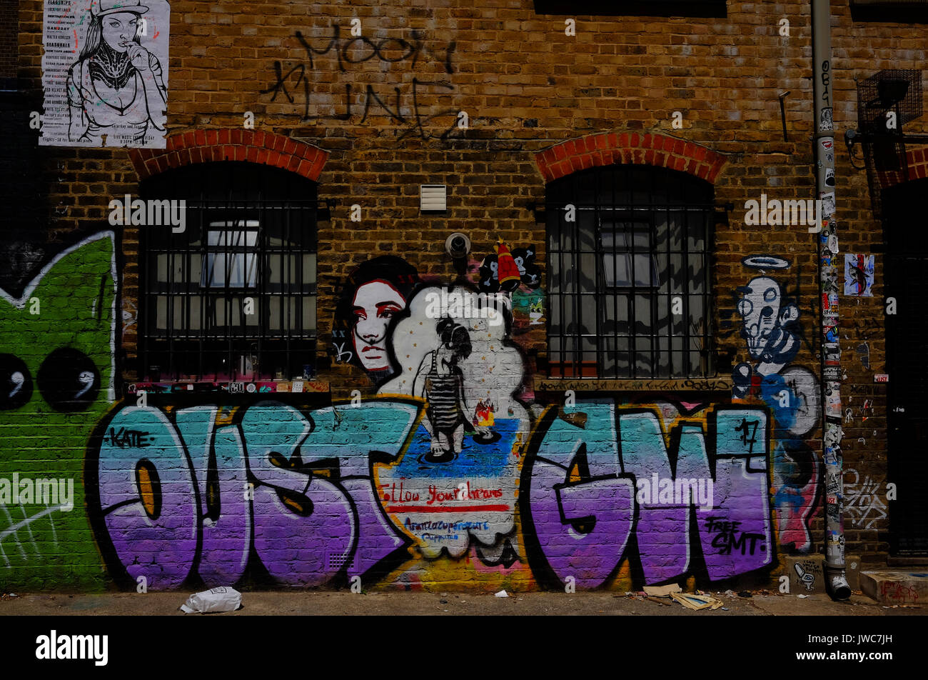 Graffiti Kunst an den Wänden im Bereich der Brick Lane London E1 Stockfoto