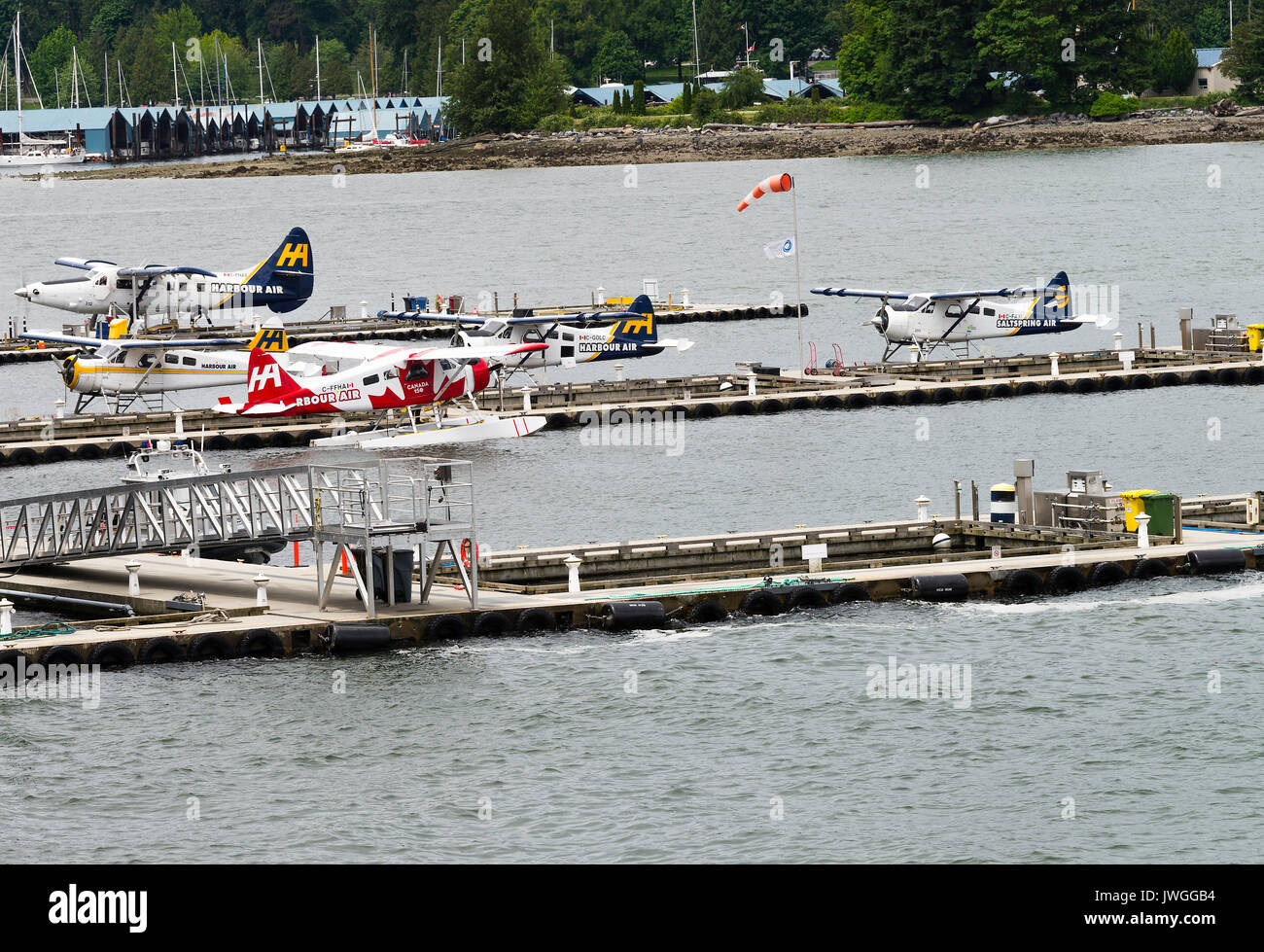 Harbour Air wasserflugzeuge an der Anlegestelle Plattformen auf Wasser in Vancouver British Columbia Kanada angedockt Stockfoto