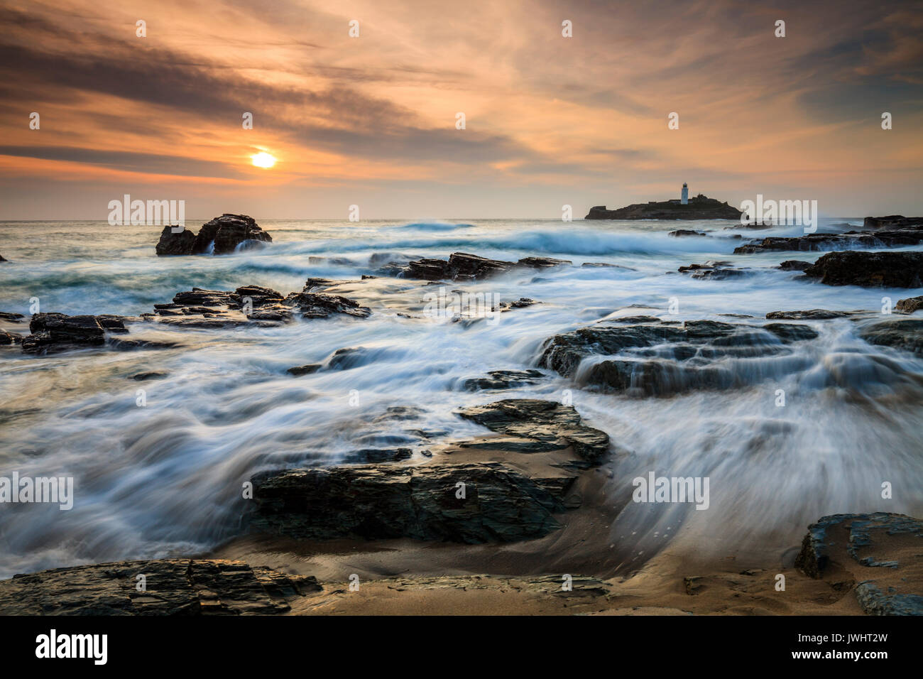 Godrevy bei Sonnenuntergang eingefangen. Stockfoto