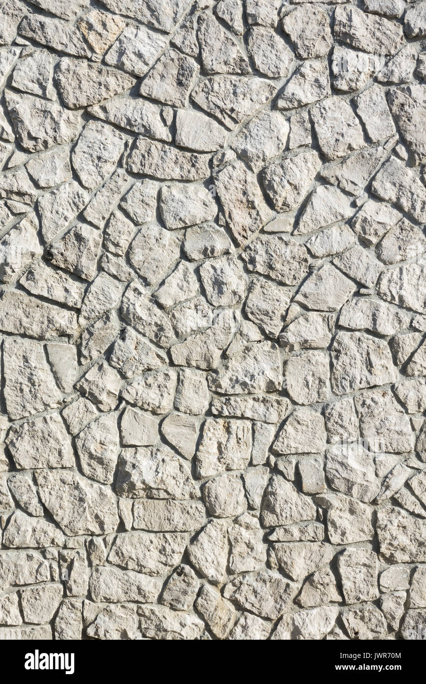 Hintergrund - gestapelten Steinmauer. Stockfoto