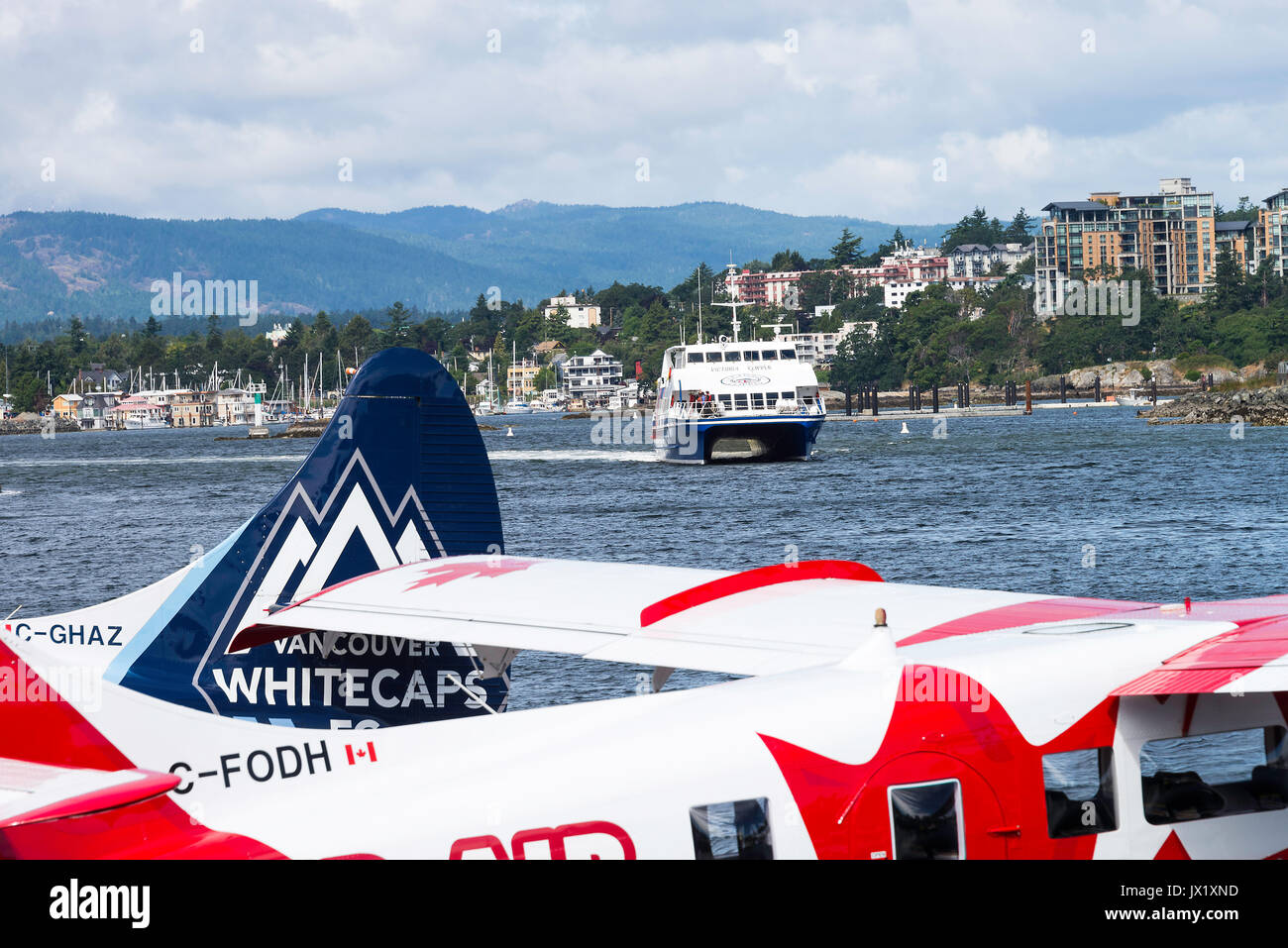 Bunte Wasserflugzeuge in den inneren Hafen von Victoria mit Boote und Fähren auf Vancouver Island British Columbia Kanada Stockfoto