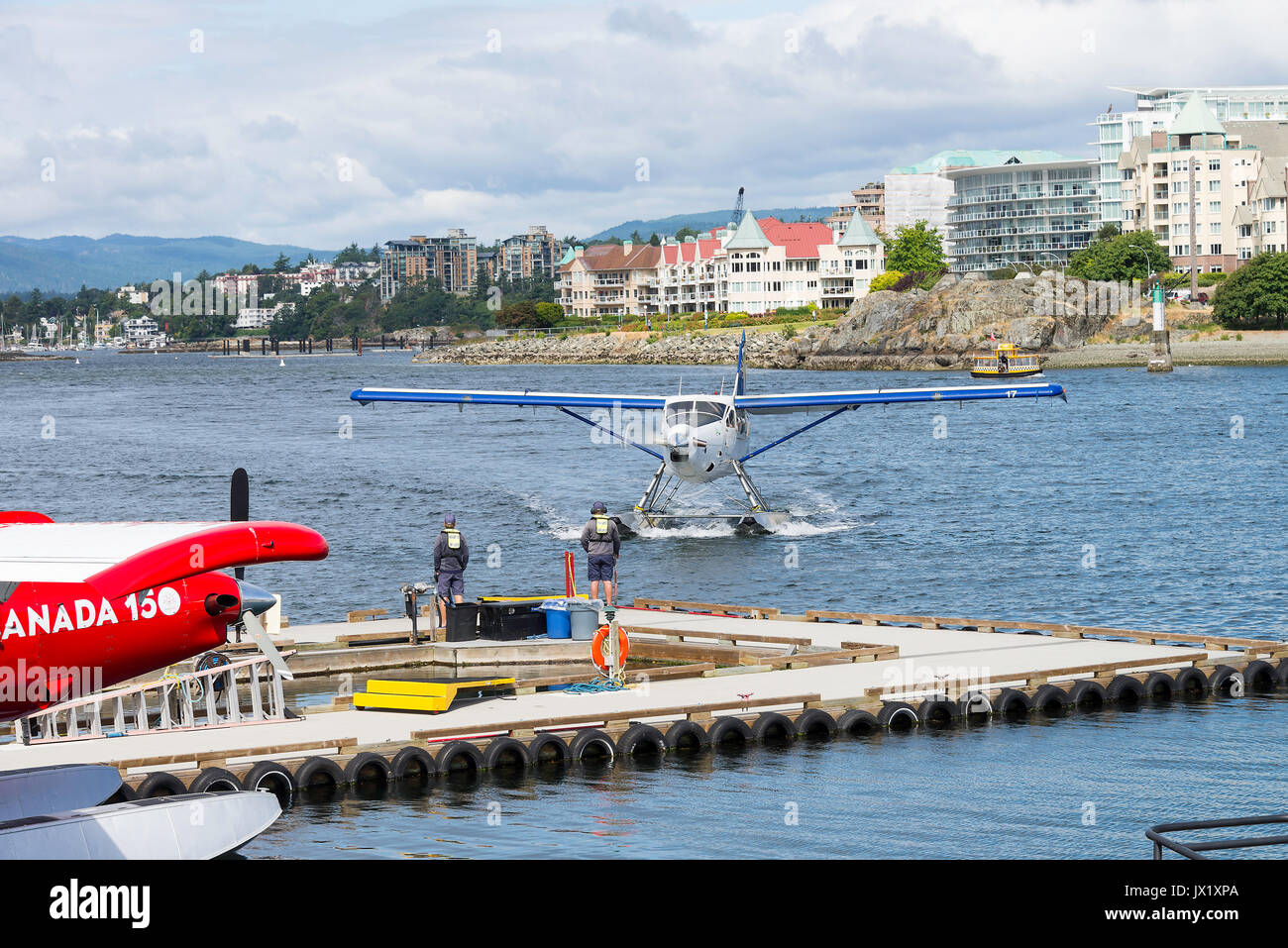 Bunte Wasserflugzeuge in den inneren Hafen von Victoria mit Boote und Fähren auf Vancouver Island British Columbia Kanada Stockfoto