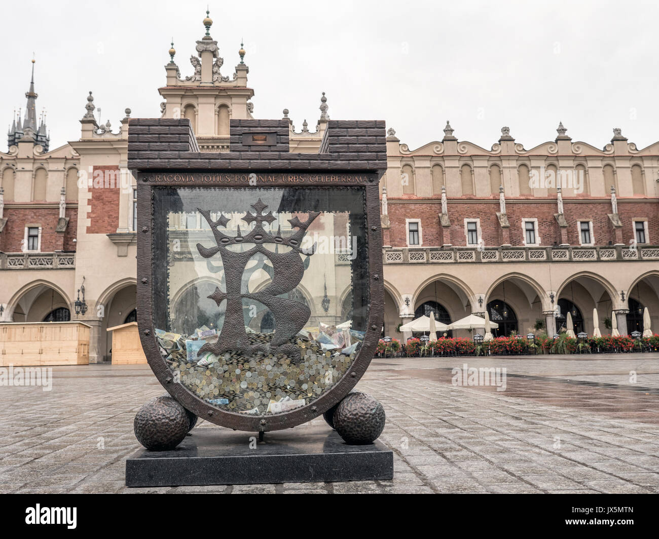 Stilisierte Geld-Box am Marktplatz in Krakau, Polen Stockfoto