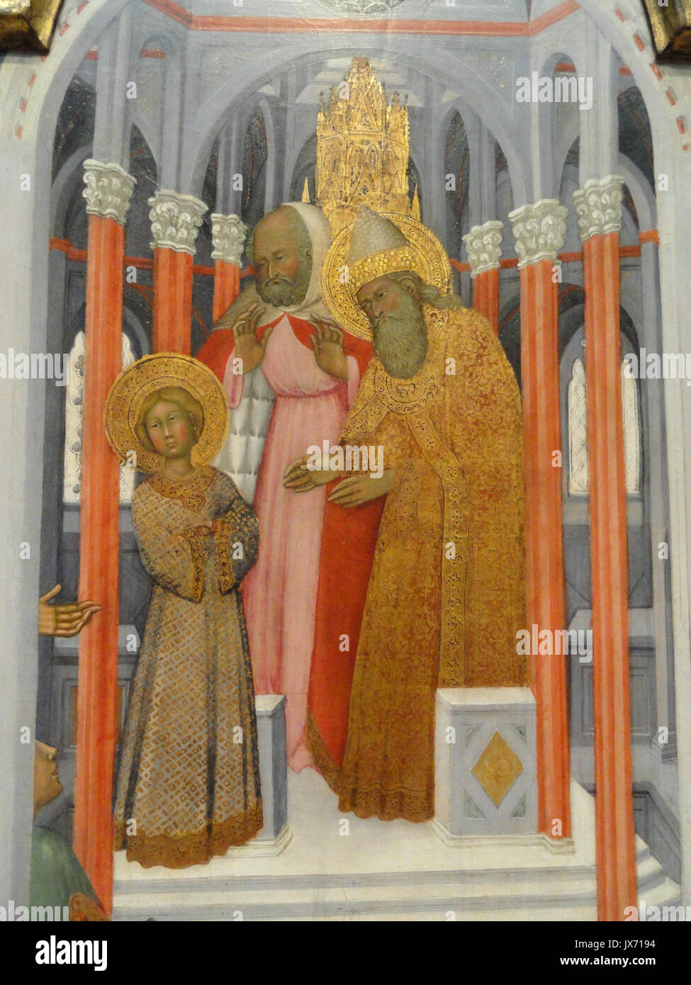 „Die Darstellung der Jungfrau“ von Paolo di Giovanni Fei stellt einen Schlüsselmoment aus dem Leben der Jungfrau Maria dar. Das um 1400 entstandene Tempera-Gemälde spiegelt religiöse Kunst der Frührenaissance in Italien wider. Stockfoto