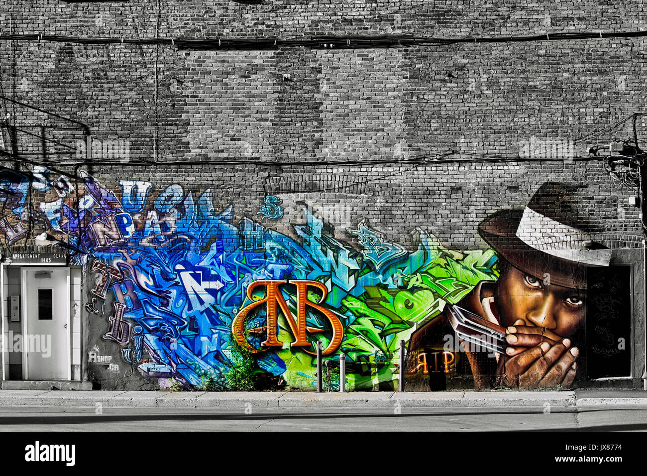 Graffiti wall in Montreal Graffitis, Straße, Tür, Big City Music Musiker Stockfoto