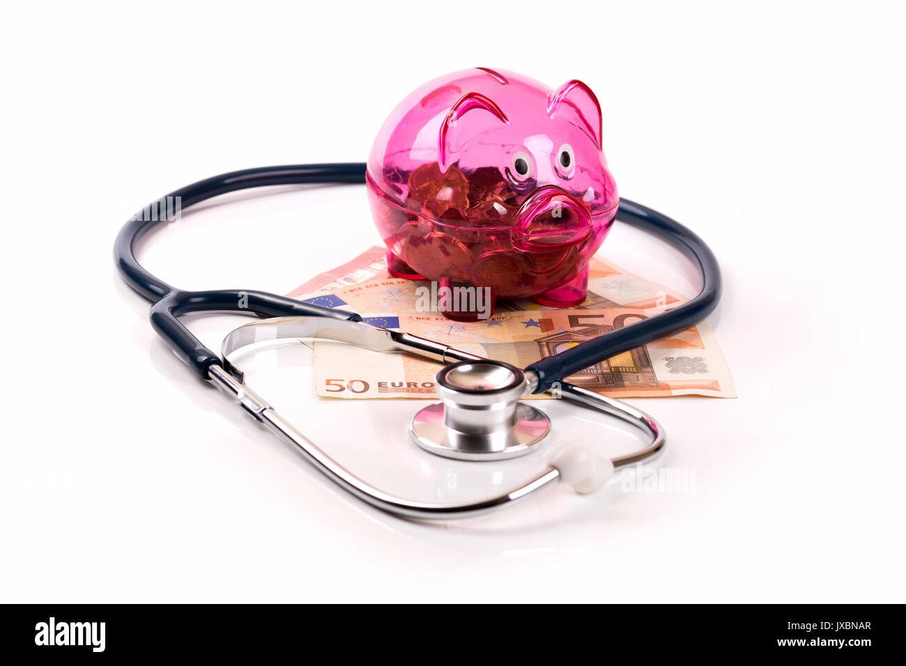 Gesundheitswesen Versicherung und Budget Konzept. Sparschwein mit Stethoskop Stockfoto