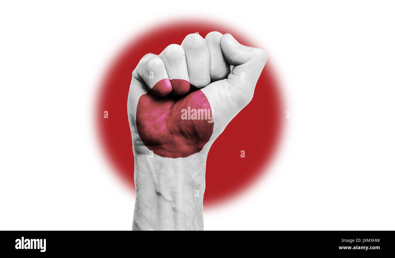 Japan Flagge auf einer geballten Faust gemalt. Stärke, Kraft, Protest Konzept Stockfoto