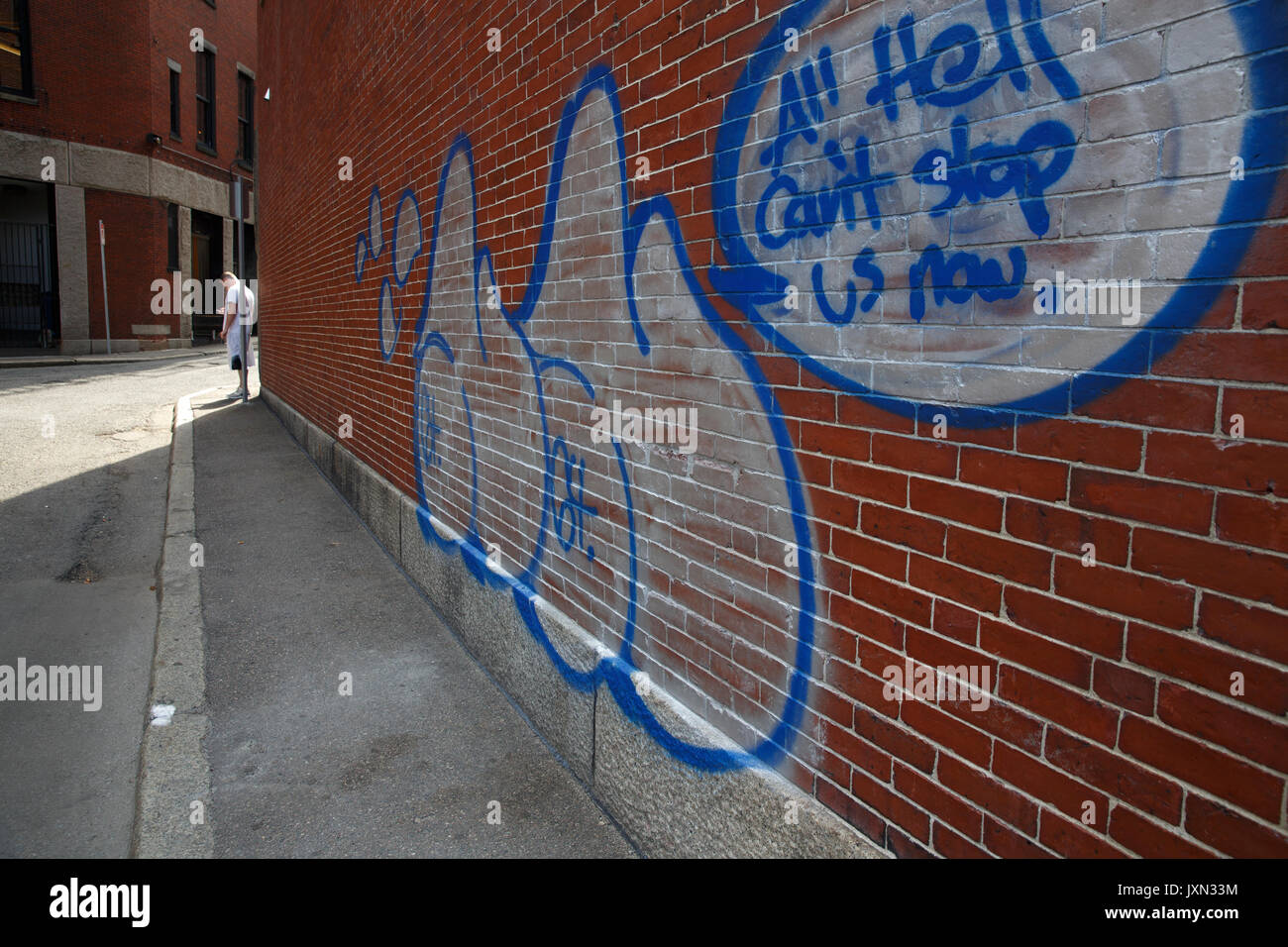 Graffiti auf Red brick wall Boston Massachusetts Stockfoto
