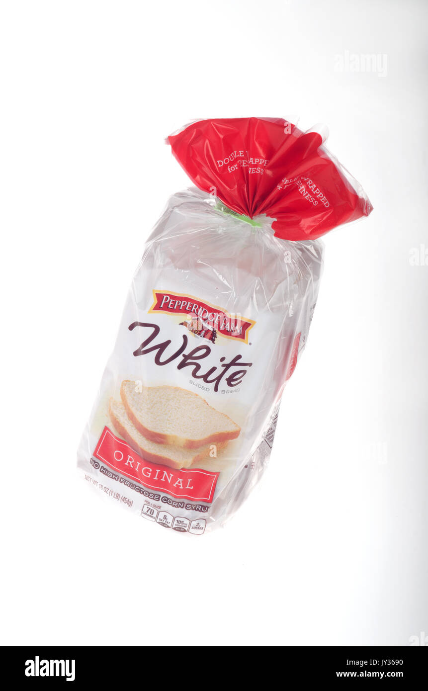 Ungeöffnete Laib Pepperidge Farm Original weiß Brot in der Verpackung auf weißem Hintergrund, ausgeschnitten. USA Stockfoto