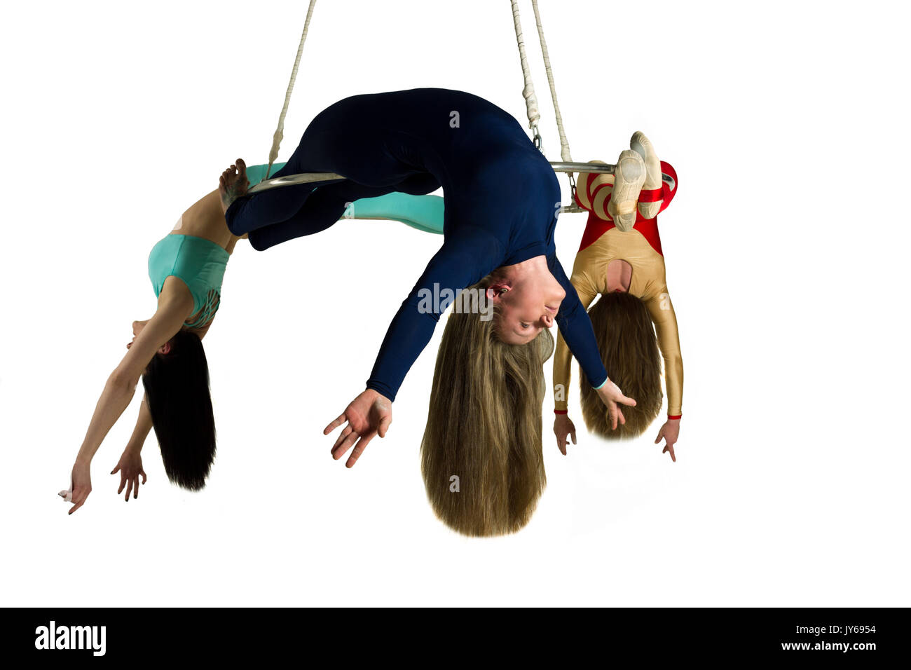 Die junge Frau Trio tun som akrobatische Tricks auf Antenne Glanz Stockfoto